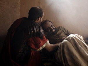 His master a wealthy centurion commanding officer in the Roman army sat beside his bed feeling totally helpless not knowing what to do