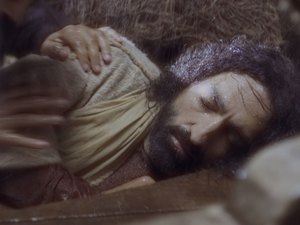 One of the disciples started shaking Jesus trying to awaken him, screaming loudly to be heard
