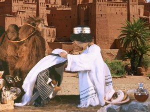Then Melchizedek blessed Abram and Abram gave him a tenth of all
the goods he had taken