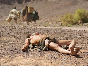 They beat him up and left him
lying half dead by the side of the road
