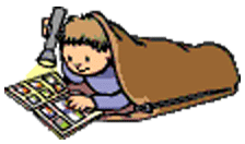 Boy reading with a flashlight